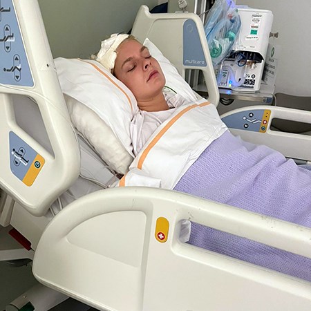 Mez in bed in hosptial