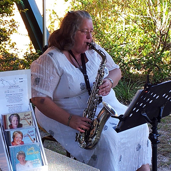 Lynette playing the saxophone 