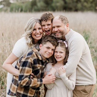 Rachael with her children and husband
