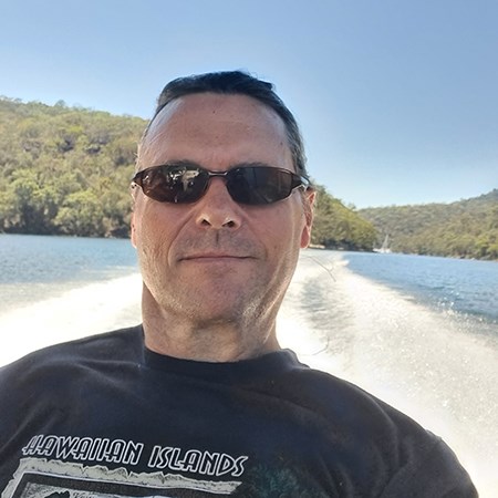 Setten Stephenson smiling on a boat