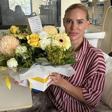 Brook with flowers being discharged from hospital