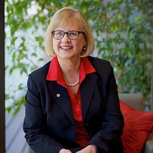 Prof Linda Kristjanson seated
