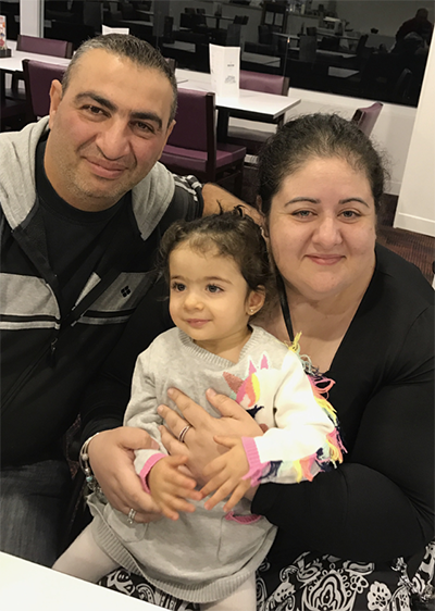 Joanna and her family at a restaurant