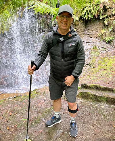Eddie hiking with his daughter