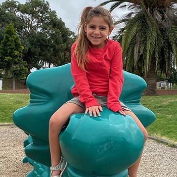 Alexis playing in the park