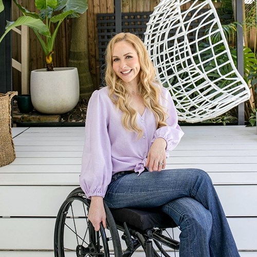 Lisa sitting in her wheelchair