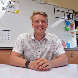 Mitch is now a teacher, he is in his classroom