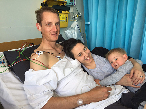 Jake with his wife and son in hospital 