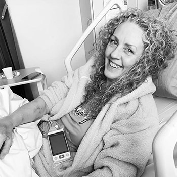 Brooke's mama in hospital smiling