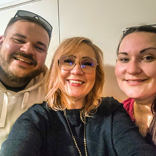 Katherine with her children smiling