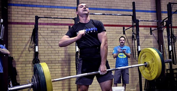 Richard doing a deadlift with one hand