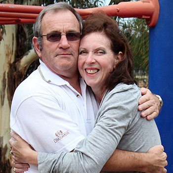 Neil hugging his daughter